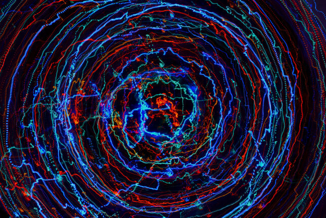 An abstract image of a blue and red spiral.