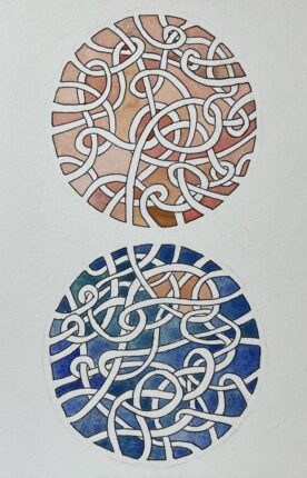 A watercolor painting of two circles with a pattern on them.