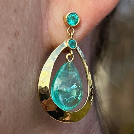 Emerald tear drop earrings.