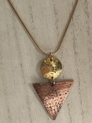 A necklace with a triangle and circle on it.