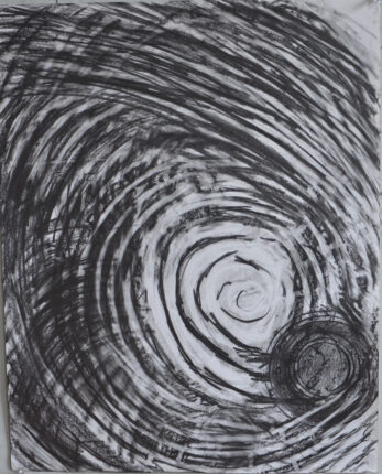 A black and white drawing of a spiral.
