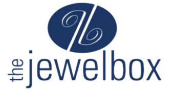 A blue and white logo of jewelbox.