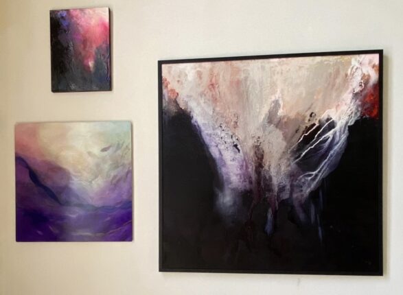 A couple of paintings on the wall
